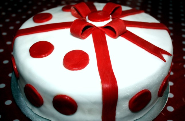 Polka dot cake and red ribbon
